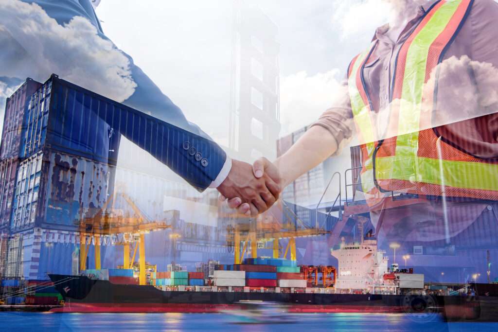 Maiser Group - Predictive & Preventive Maintenance - Service Agreement Double exposure of businessman and engineer wearing a hardhat standing cargo at the container yard and greeting each other with handshake on cargo freight ship for import and export. Teamwork concept.