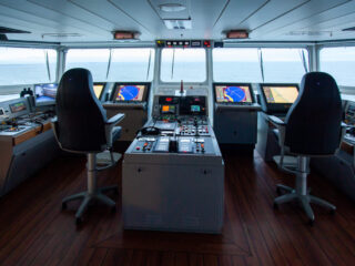 An inside look of the control centre of a superyacht on the sea