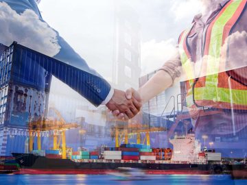 Maiser Group - Predictive & Preventive Maintenance - Service Agreement Double exposure of businessman and engineer wearing a hardhat standing cargo at the container yard and greeting each other with handshake on cargo freight ship for import and export. Teamwork concept.