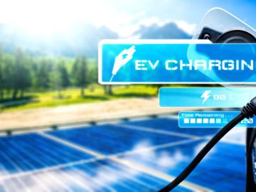 EV charging station for electric car in concept of alternative green energy produced from sustainable resources to supply to charger station in order to reduce CO2 emission .