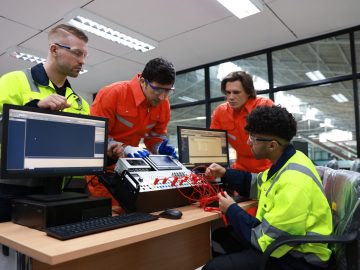 Technician and engineer in AI and Robotic training class, training AI Robot  the KIT equipment  and Artificial Intelligence of Things service robots in the manufacturing automation and robotics classroom